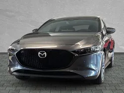 Machine grey Neu 2025 Mazda 3 Takumi-Line Limousine | 32.490 € (Teuer)