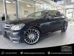Magnetitschwarz metalliclack Gebraucht 2021 Mercedes C200 AMG line Coupé | 18.990 €
