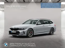 Grau Gebraucht 2024 BMW 330e M Sport Kombi | 62.599 €