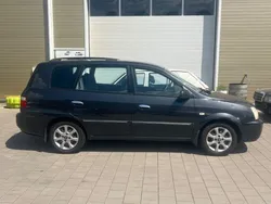 Grau Gebraucht 2004 Kia Carens EX Van / Kleinbus | 1.999 € (Guter Preis)