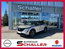 Warm silver metallic/dach und Gebraucht 2024 Nissan Ariya Evolve SUV | 47.500 € (Fairer Preis)