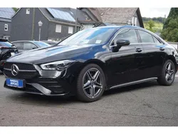 Schwarz (metallic) Gebraucht 2024 Mercedes CLA200 AMG Coupé | 39.100 € (Teuer)