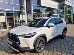 Platinum white pearl mc. Gebraucht 2022 Toyota Corolla Cross Team SUV | 29.980 €