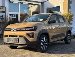 Safaribeige Gebraucht 2024 Dacia Spring Expression Kleinwagen | 17.490 € (Fairer Preis)