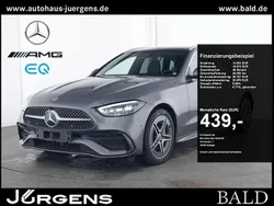 Grau selenitgrau metallic Gebraucht 2024 Mercedes C300e AMG Kombi | 46.680 € (Superpreis)