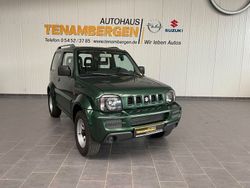 Gruen (metallic) Gebraucht 2011 Suzuki Jimny Comfort SUV | 9.400 €