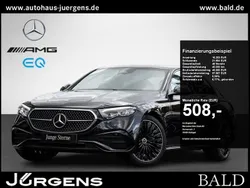 Schwarz obsidianschwarz metallic Gebraucht 2024 Mercedes E220 AMG Limousine | 53.010 € (Fairer Preis)