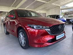 Soul red crystal (metallic) Gebraucht 2024 Mazda CX-5 Takumi-Line SUV | 38.900 € (Fairer Preis)