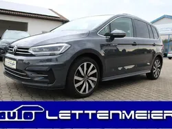 Grau Gebraucht 2024 VW Touran Highline Van / Kleinbus | 37.290 € (Etwas zu teuer)