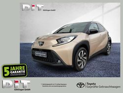 Ginger beige (4u9)/ black mica Gebraucht 2023 Toyota Aygo Pulse Kleinwagen | 15.990 € (Guter Preis)