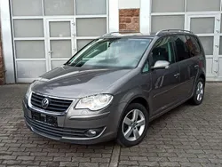 Grau Gebraucht 2009 VW Touran United Van / Kleinbus | 4.190 € (Fairer Preis)