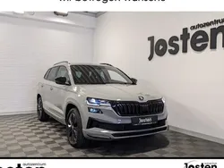 Grau Gebraucht 2024 Skoda Karoq SportLine SUV | 34.890 € (Superpreis)