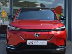 Vermilion red p. Gebraucht 2023 Honda e:Ny1 Advance SUV | 29.980 € (Fairer Preis)