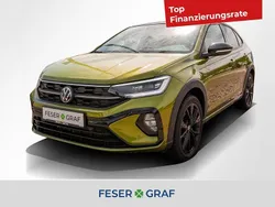 Visual green metallic / schwarz Gebraucht 2024 VW Taigo R-line SUV | 27.850 € (Fairer Preis)