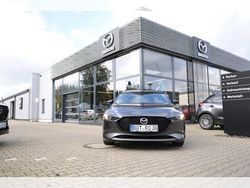 Grau (machine gray) Gebraucht 2024 Mazda 3 Homura-Line Limousine | 25.370 € (Teuer)