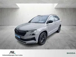 Grau Gebraucht 2024 Skoda Karoq SportLine SUV | 36.333 € (Fairer Preis)