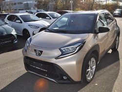 Ginger beige metallic/ night sky black Gebraucht 2022 Toyota Aygo X X-plore SUV | 16.950 € (Etwas zu teuer)