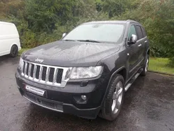 Schwarz (metallic) Gebraucht 2012 Jeep Grand Cherokee Overland SUV | 5.999 €