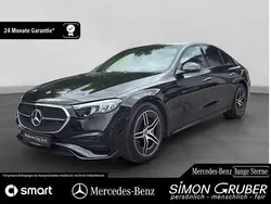 Obsidianschwarz (metallic) Gebraucht 2023 Mercedes E220 AMG Limousine | 49.450 € (Fairer Preis)