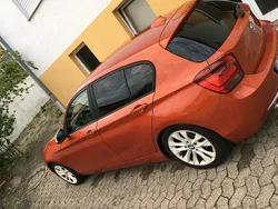 Orange Gebraucht 2012 BMW 120 Lifestyle Kleinwagen | 10.500 €