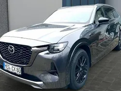 Grau Gebraucht 2024 Mazda CX-80 Homura-Line SUV | 57.500 € (Fairer Preis)