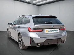 Grau Gebraucht 2024 BMW 330e Kombi | 53.899 €