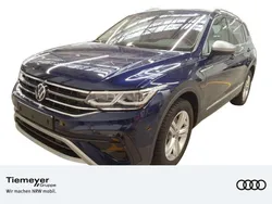 Atlantic blue metallic Gebraucht 2024 VW Tiguan Allspace Elegance SUV | 38.870 € (Superpreis)