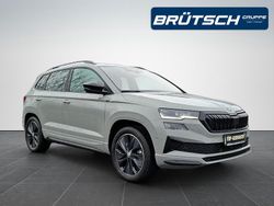 Steelgrau Gebraucht 2023 Skoda Karoq SportLine SUV | 35.880 € (Fairer Preis)