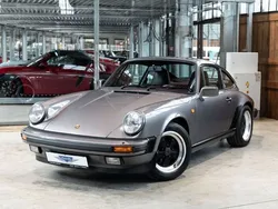 Meteor grau (metallic) Gebraucht 1986 Porsche 911 Carrera Coupé | 98.890 €