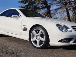Alabasterweiß Gebraucht 2007 Mercedes SL55 AMG AMG Cabrio | 64.624 €