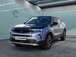 Grau Gebraucht 2023 Opel Mokka-e Elegance SUV | 23.740 € (Teuer)