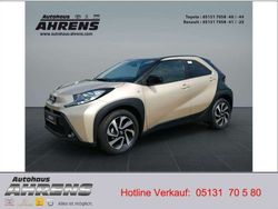 Ginger beige / night sky black Gebraucht 2024 Toyota Aygo X Team SUV | 15.990 € (Fairer Preis)