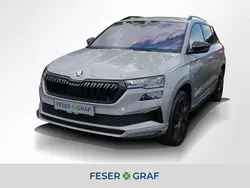 Stahlgrau Gebraucht 2024 Skoda Karoq SportLine SUV | 33.770 € (Fairer Preis)