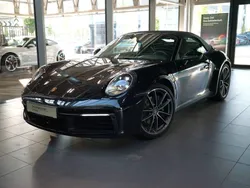 Tiefschwarzmetallic Gebraucht 2024 Porsche 911 Carrera Cabrio | 143.911 € (Etwas zu teuer)
