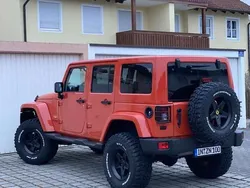 Orange Gebraucht 2015 Jeep Wrangler Unlimited Sahara SUV | 34.999 € (Teuer)
