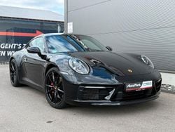 Tiefschwarzmetallic (metallic) Gebraucht 2021 Porsche 911 Carrera 4S Coupé | 134.790 € (Fairer Preis)