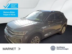 Indiumgrau metallic/schwarz Gebraucht 2024 VW T-Roc Style SUV | 28.730 € (Guter Preis)