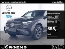 Graphitgrau metallic Gebraucht 2024 Mercedes GLC300e AMG Coupé | 73.840 € (Fairer Preis)