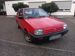 Rot Gebraucht 1990 Nissan Micra Kleinwagen | 2.200 €