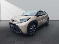 Ginger beige (4u9)/ black mica Neu 2025 Toyota Aygo X SUV | 20.890 €