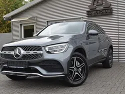 Grau Gebraucht 2022 Mercedes GLC300e AMG Limousine | 50.999 €