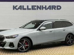 Grau Gebraucht 2024 BMW i5 M Sport Kombi | 67.830 €