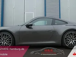 Grau Gebraucht 2024 Porsche 911 Carrera Coupé | 128.900 € (Guter Preis)