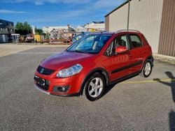 Orange Gebraucht 2013 Suzuki SX4 Comfort Limousine | 8.300 € (Fairer Preis)