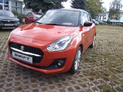 Bernstein orange Gebraucht 2023 Suzuki Swift Comfort Kleinwagen | 19.290 € (Fairer Preis)