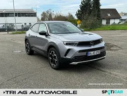 Kontrast grau (metallic) Gebraucht 2023 Opel Mokka-e Ultimate SUV | 26.810 € (Teuer)