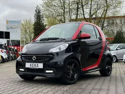 Deep black & carmine red Gebraucht 2012 Smart ForTwo Coupé Coupé | 10.990 €