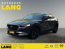 Machine gray (metallic) Gebraucht 2024 Mazda CX-30 Homura-Line SUV | 26.990 € (Fairer Preis)