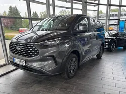 Grey metallic Gebraucht 2024 Ford Tourneo Custom Titanium Van / Kleinbus | 48.990 € (Fairer Preis)