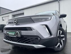 Grau Gebraucht 2021 Opel Mokka-e Elegance SUV | 16.860 € (Fairer Preis)